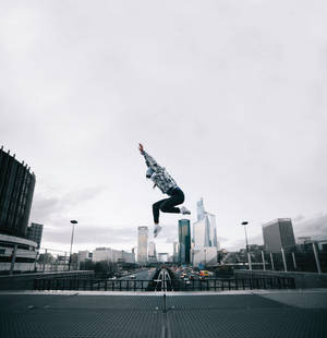 Midair Parkour In City Wallpaper