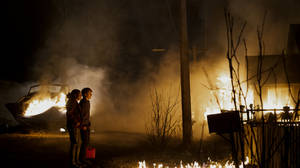 Midnight Mass Teenagers On Burning House Wallpaper