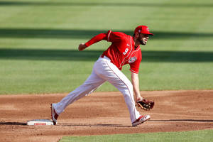 Mike Moustakas Reaching Low Wallpaper