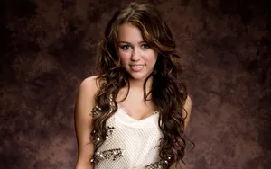 Miley Cyrus Cheerfully Rejoices In Her Natural Look Wallpaper