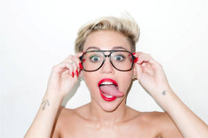 Miley Cyrus Showing Her Goofy Side Wallpaper