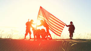 Military Holding American Flag Wallpaper