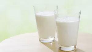 Milk Glasses On Circular Table Wallpaper