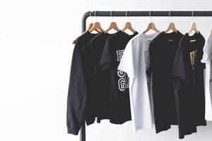 Minimalist Black Clothes Rack Wallpaper