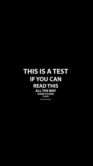 Minimalist Eye Test Text On Black Wallpaper