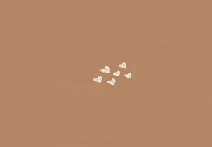 Minimalist Heartson Brown Background Wallpaper
