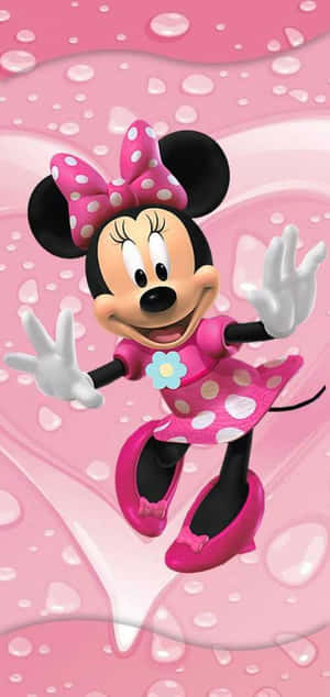Minnie Mouse Looking Adorable In Her Signature Pink Bow. Wallpaper