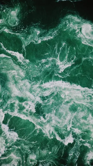 Mint Green Marble Wall With Unique And Intricate Patterns Wallpaper