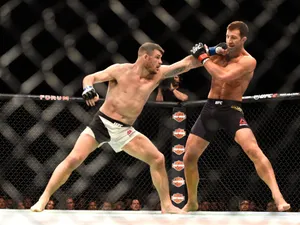 Mma Athlete Michael Bisping And Luke Rockhold Match Wallpaper