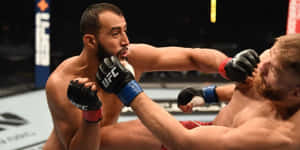 Mma Fighter Dominick Reyes In Action Wallpaper