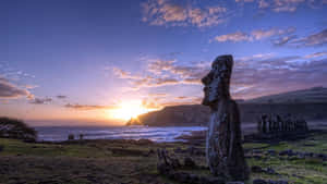 Moai Sculptures With View Of The Sea Wallpaper
