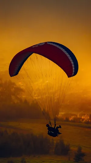 Mobile Sunset Parasailing Wallpaper