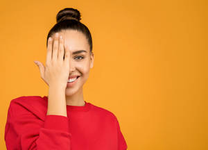 Model In Orange Background Wallpaper