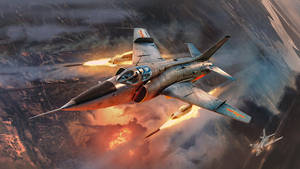 Modern Fighter Jet Soaring At Mach Speed Wallpaper