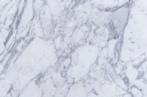 Modern Marble Desktop Overlooking City Skyline Wallpaper