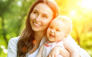 Mom And Son Smiling Wallpaper