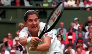Monica Seles Holding Racket Both Hands Wallpaper