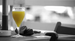 Monochrome Mango Juice In Restaurant Wallpaper