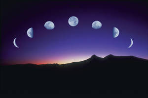 Moon Phases In Sunrise Sky Wallpaper