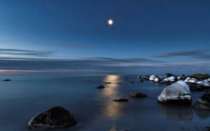 Moonlight Glistening On The Shoreline Wallpaper