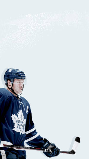 Morgan Rielly Holding A Stick Wallpaper