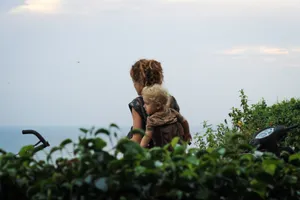 Mother Child Seaside Bonding Wallpaper