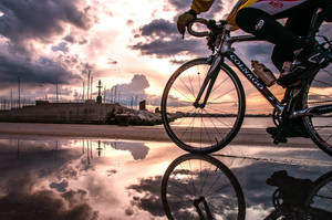 Mountain Bike With Overcast Clouds Wallpaper