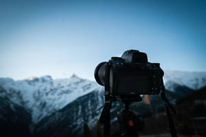 Mountain Photography With Black Dslr Camera Wallpaper