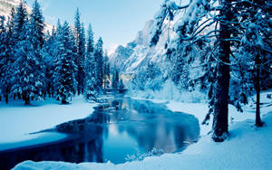 Mountain Riverside During Winter Wallpaper