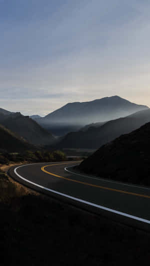 Mountain_ Road_at_ Dusk Wallpaper