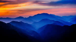 Mountains Sunset Blue And Orange Wallpaper