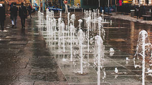 Moving Water From A Fountain Wallpaper