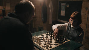 Mr. Shaibel Teaches Beth, A Young Chess Prodigy, In 'the Queen's Gambit'. Wallpaper