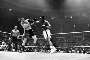 Muhammad Ali Delivers A Powerful Punch Wallpaper