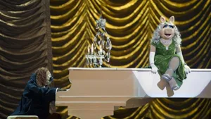 Muppets Most Wanted Miss Piggy On Piano Wallpaper