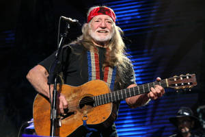 Musician Willie Nelson Concert Performance Wallpaper