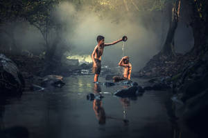 Myanmar Kid In River Wallpaper