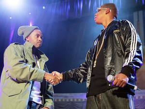 Nas And Jay Z On Stage Together Wallpaper