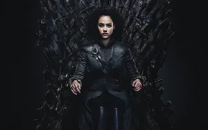 Nathalie Emmanuel Sitting On Throne Wallpaper