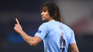 Nathan Ake Doing A Hand Gesture Wallpaper