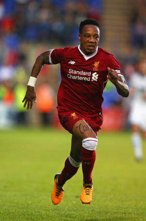 Nathaniel Clyne Running On The Field Wallpaper