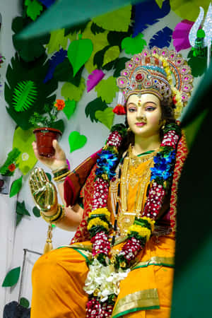 Nav Durga Idolin Colorful Attire Wallpaper