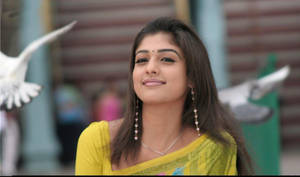 Nayanthara In Yellow Saree Wallpaper