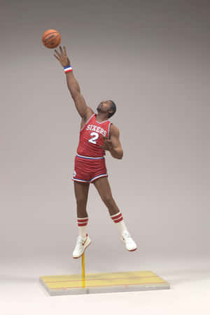 Nba Athlete Moses Malone Figurine Wallpaper