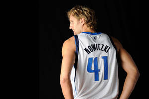 Nba Legend Dirk Nowitzki In Action Wallpaper