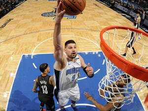 Nba Player Orlando Magic Nikola Vucevic Layup Wallpaper