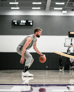 Nba Star, Domantas Sabonis Practicing Dribbling Drills Wallpaper