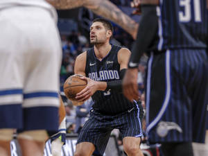 Nba Star Nikola Vucevic Takes A Free Throw Wallpaper