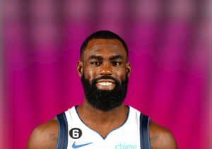 Nba Star Tim Hardaway Jr. Poster Wallpaper