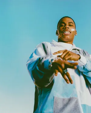 Nelly Performing On Stage Wallpaper